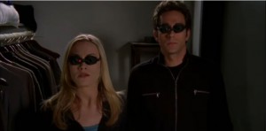 Sarah and Chuck watch the person in the apartment using x-ray goggles.