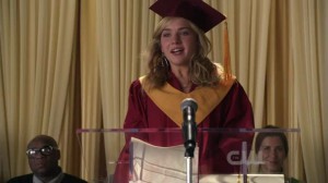 Lux gives the class speech at her high school graduation in 2012.