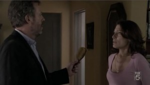 House gives Cuddy back her hairbrush.