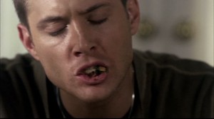 Dean eats a sandwich