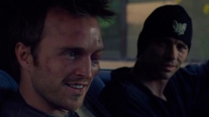 Jesse smiles at Hank's fate when Skinny Pete picks him up.